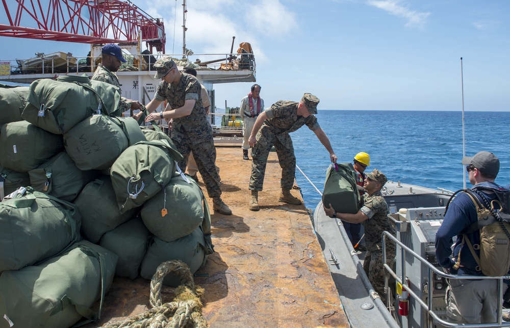 Service Members disembark USNS Mercy in Okinawa