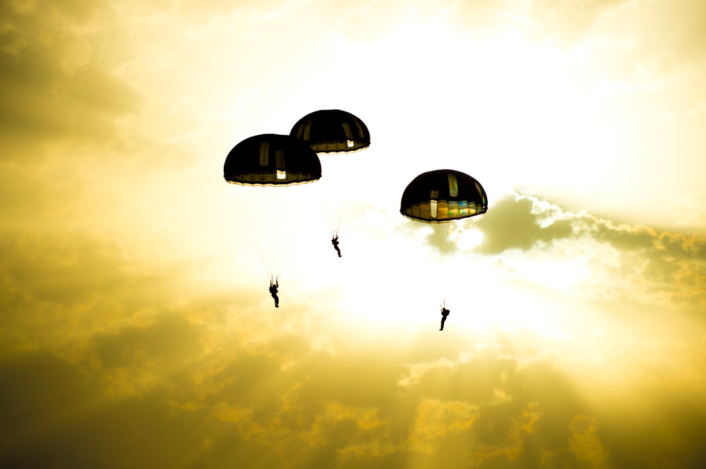 U.S. American and French Armed Forces parachute together on D-Day 74th Anniversary