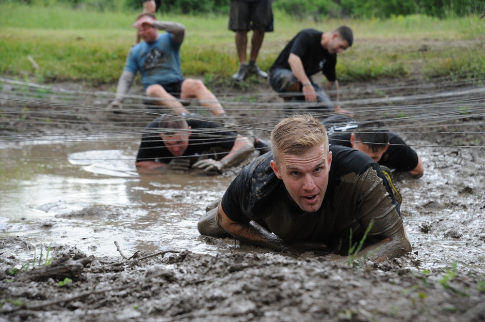 Through the muck and mire, 1,000 Fort Drum community members conquer the Mountain Mudder