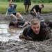 Through the muck and mire, 1,000 Fort Drum community members conquer the Mountain Mudder