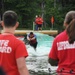 Through the muck and mire, 1,000 Fort Drum community members conquer the Mountain Mudder
