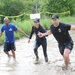 Through the muck and mire, 1,000 Fort Drum community members conquer the Mountain Mudder