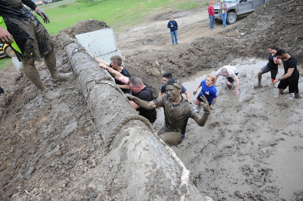 Through the muck and mire, 1,000 Fort Drum community members conquer the Mountain Mudder