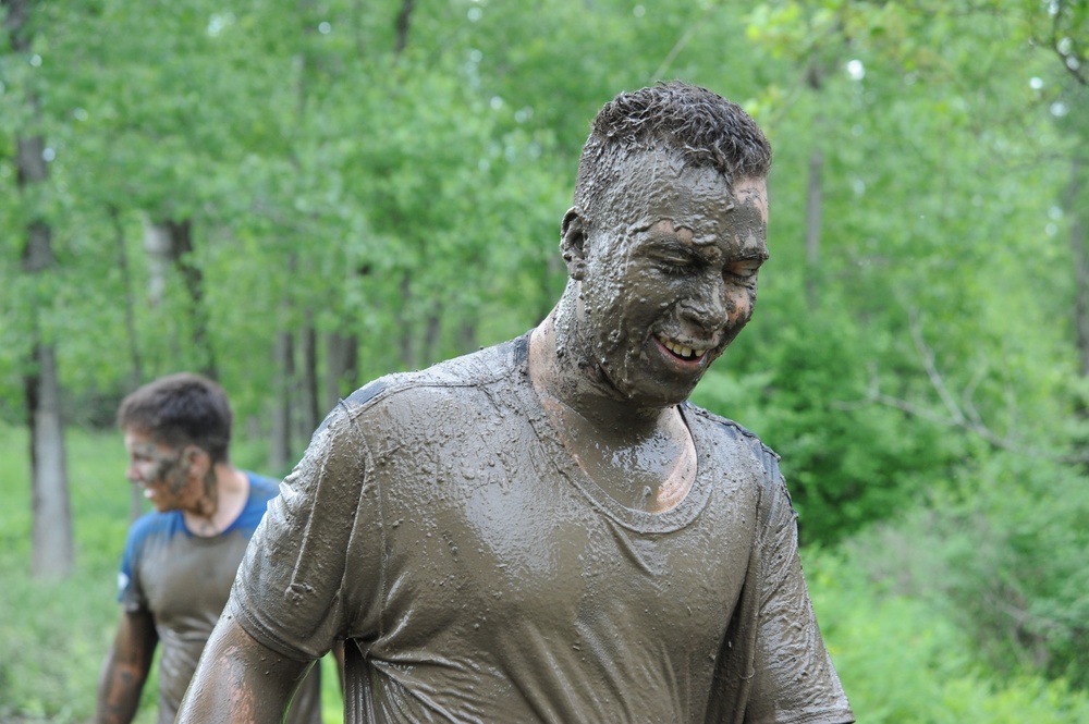 Through the muck and mire, 1,000 Fort Drum community members conquer the Mountain Mudder