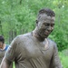 Through the muck and mire, 1,000 Fort Drum community members conquer the Mountain Mudder