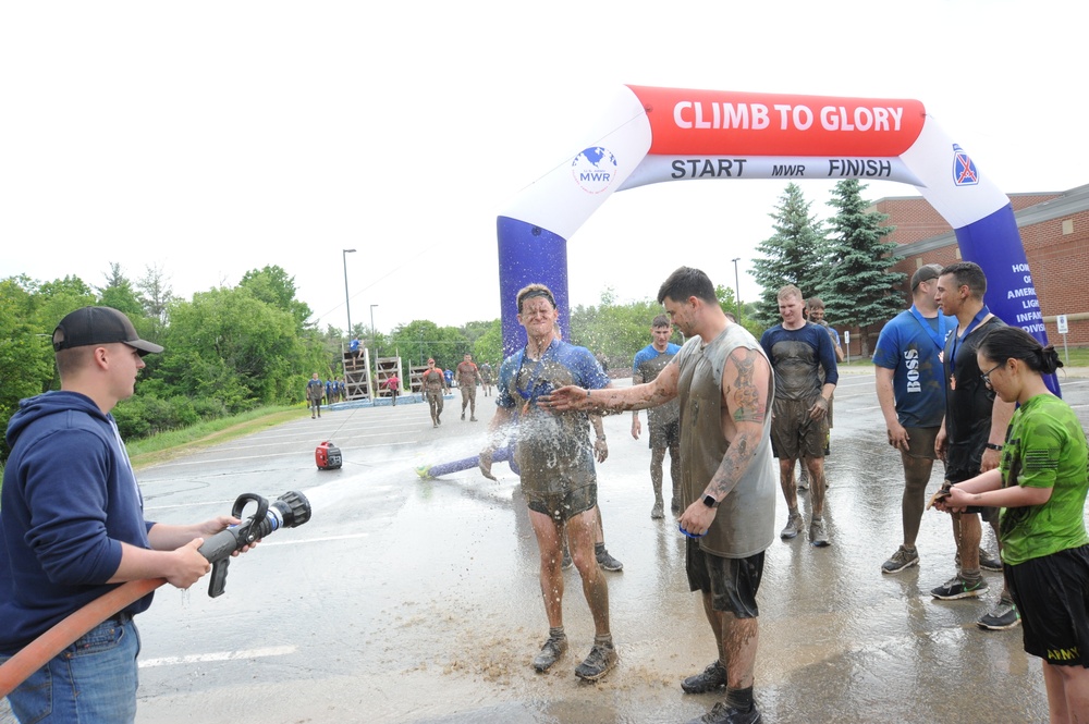 Through the muck and mire, 1,000 Fort Drum community members conquer the Mountain Mudder
