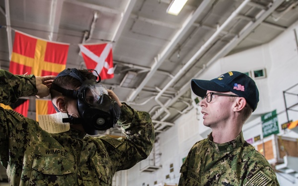 Sailors conduct gas mask trainng