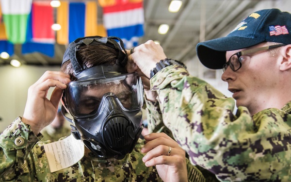 Sailors conduct gas mask trainng