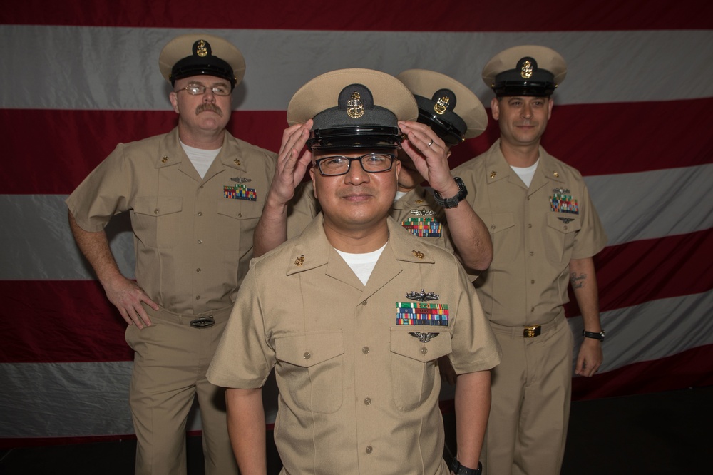 Senior Chief Petty Officers are pinned aboard USS John C. Stennis