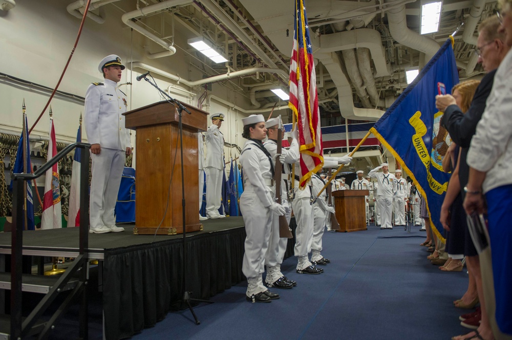 USS America Sailor perfoms national anthem during ceremony