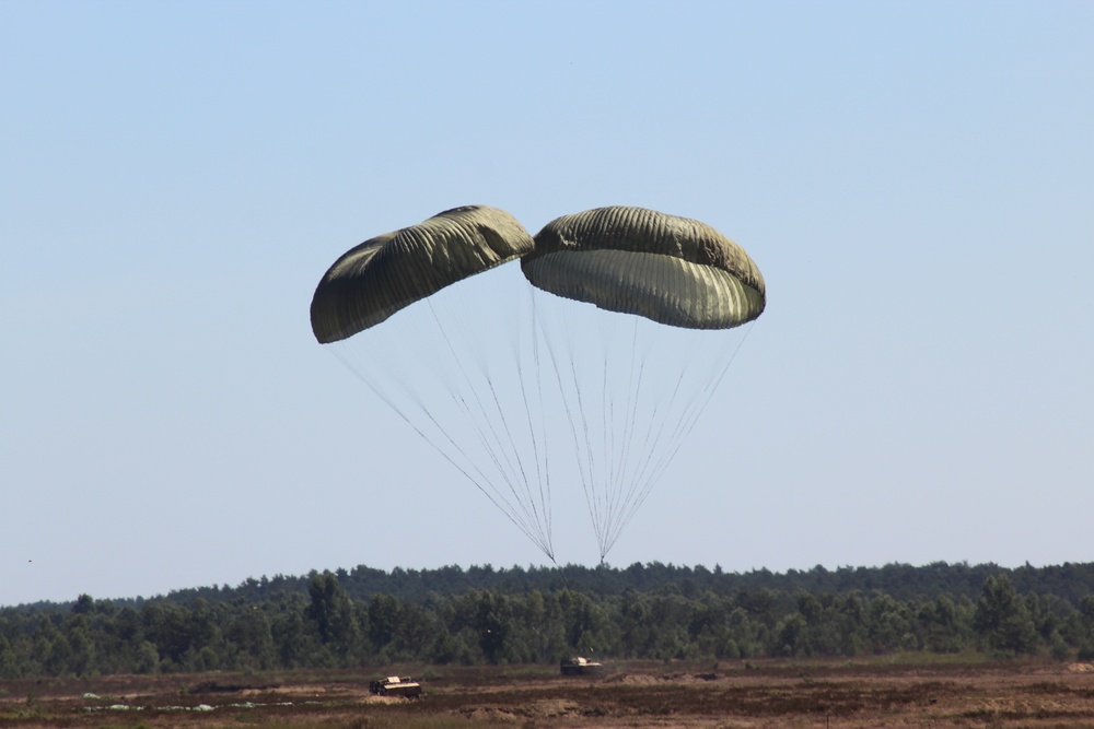 Airborne Howitzer Touches Town