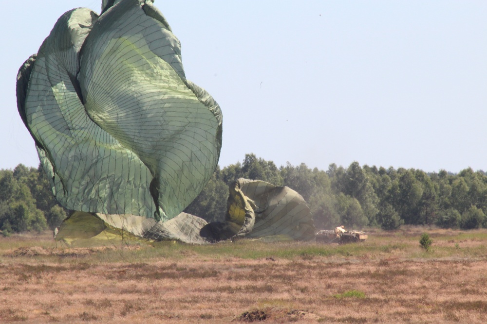 Airborne Howitzer Touches Town