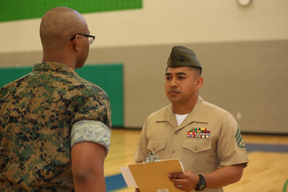 CBIRF Marines and Sailors volunteer for St. Charles High School JROTC uniform inspection