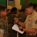 CBIRF Marines and Sailors volunteer for St. Charles High School JROTC uniform inspection