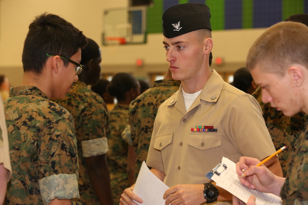 CBIRF Marines and Sailors volunteer for St. Charles High School JROTC uniform inspection