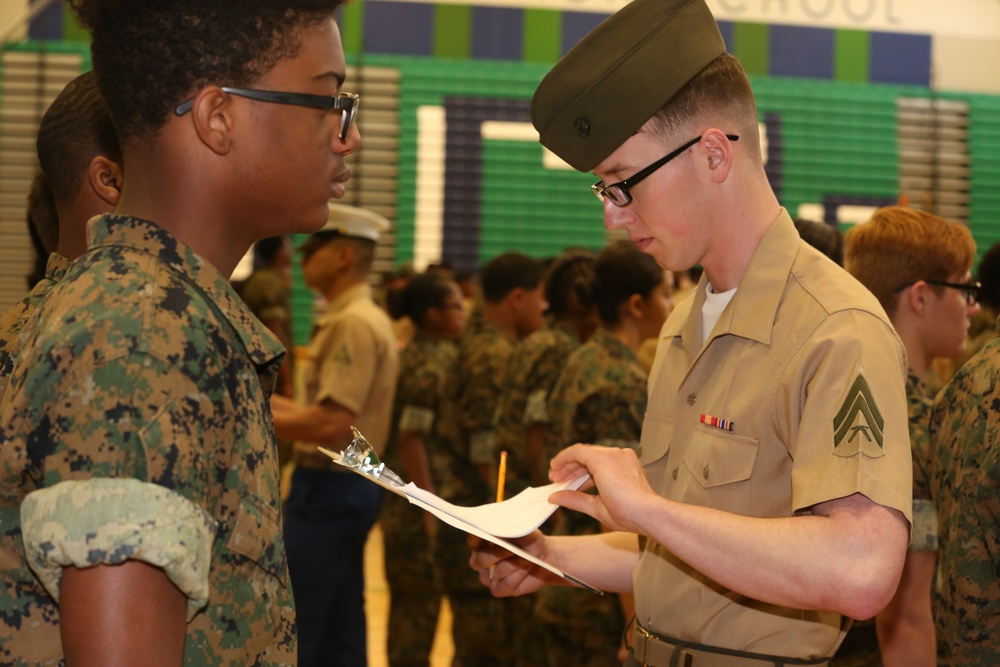 CBIRF Marines and Sailors volunteer for St. Charles High School JROTC uniform inspection