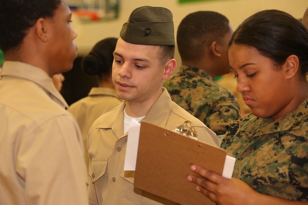 CBIRF Marines and Sailors volunteer for St. Charles High School JROTC uniform inspection