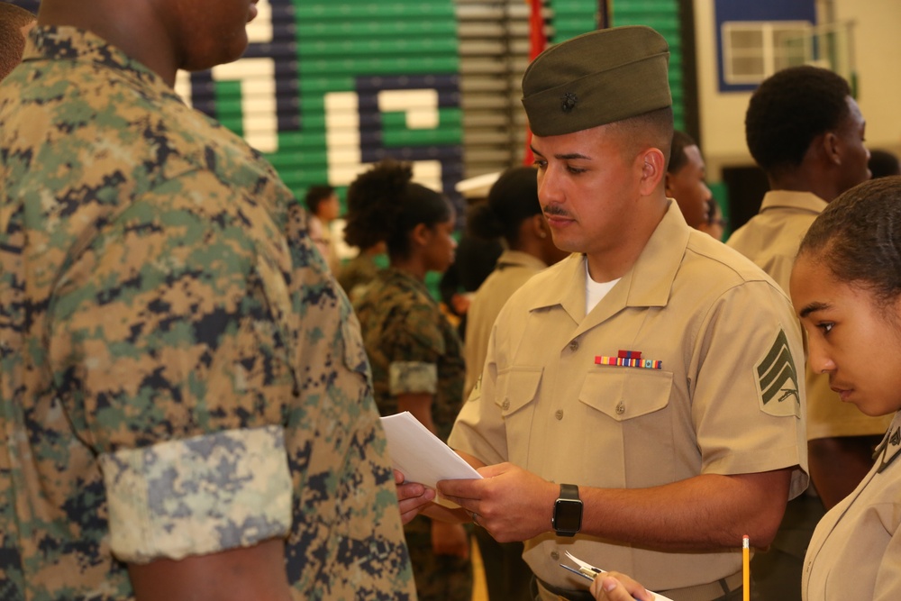 CBIRF Marines and Sailors volunteer for St. Charles High School JROTC uniform inspection