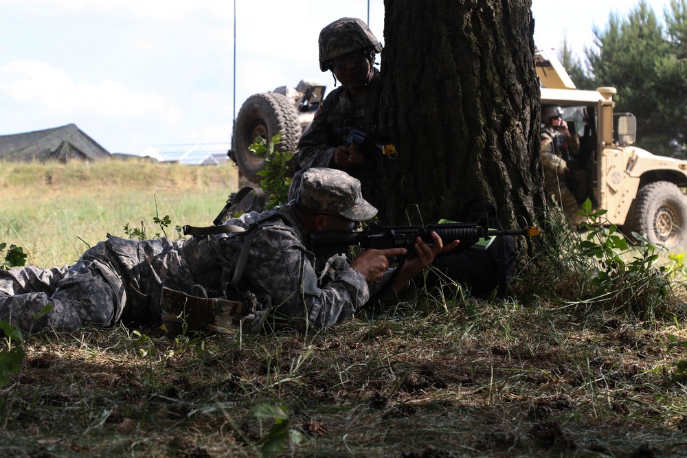 Military police react to simulated ambush