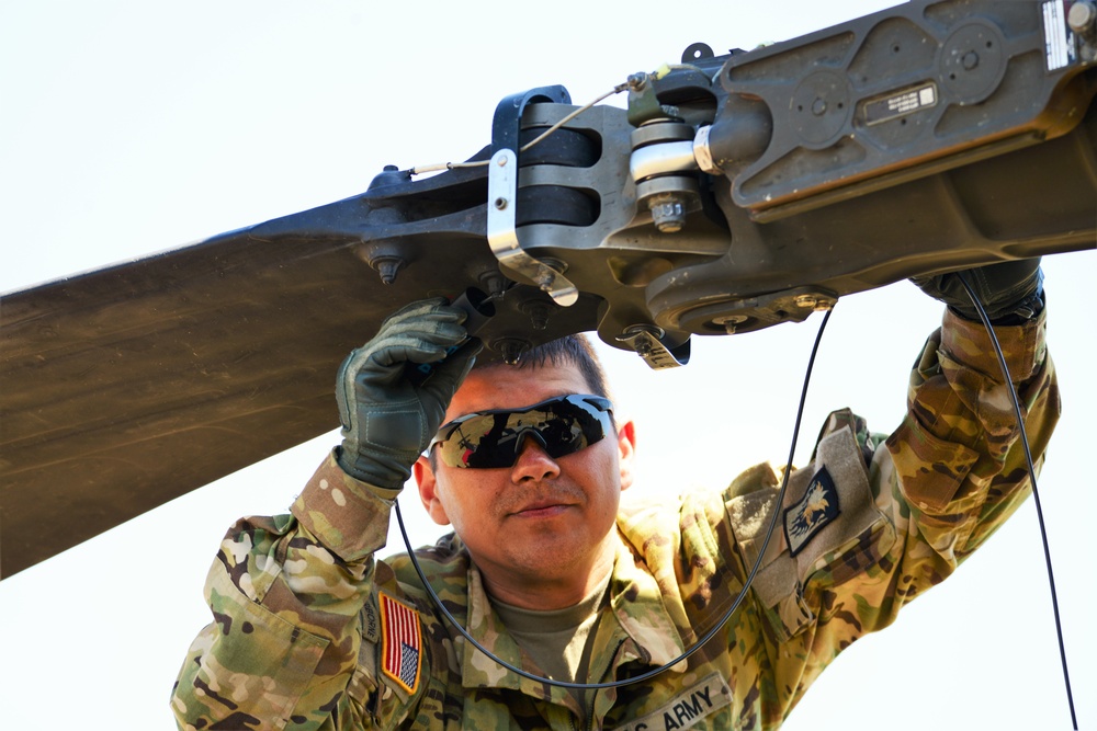 AH-64 Apache helicopter maintenance during Saber Strike 18