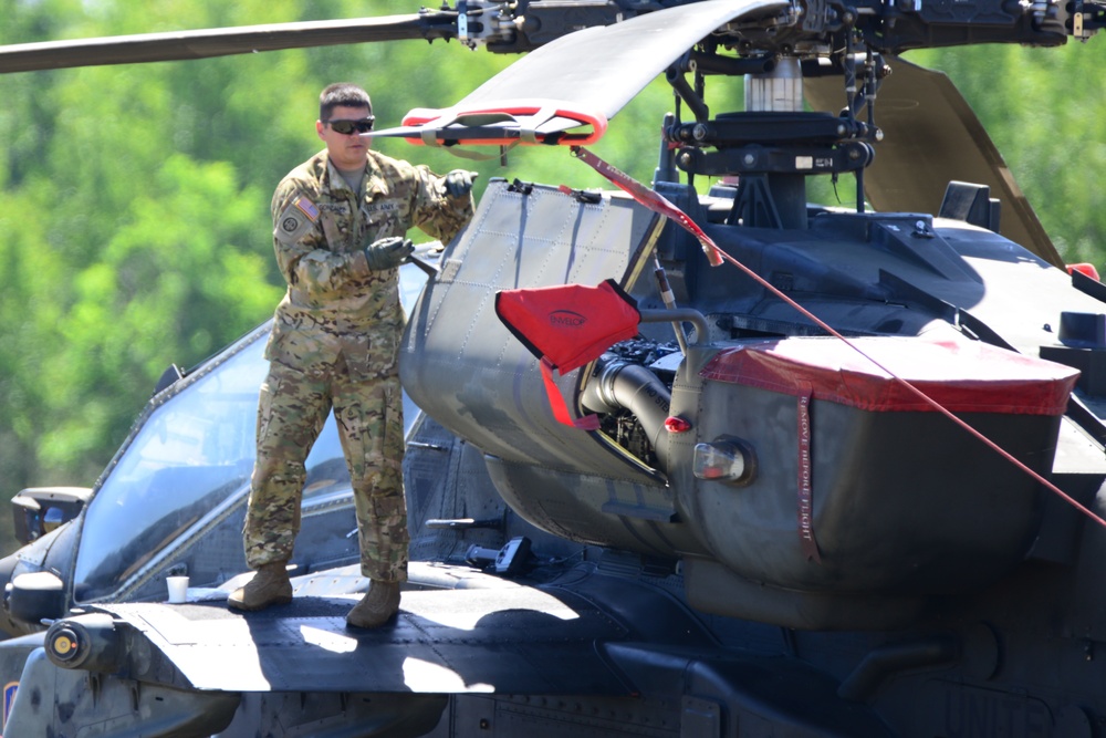 AH-64 Apache helicopter maintenance during Saber Strike 18