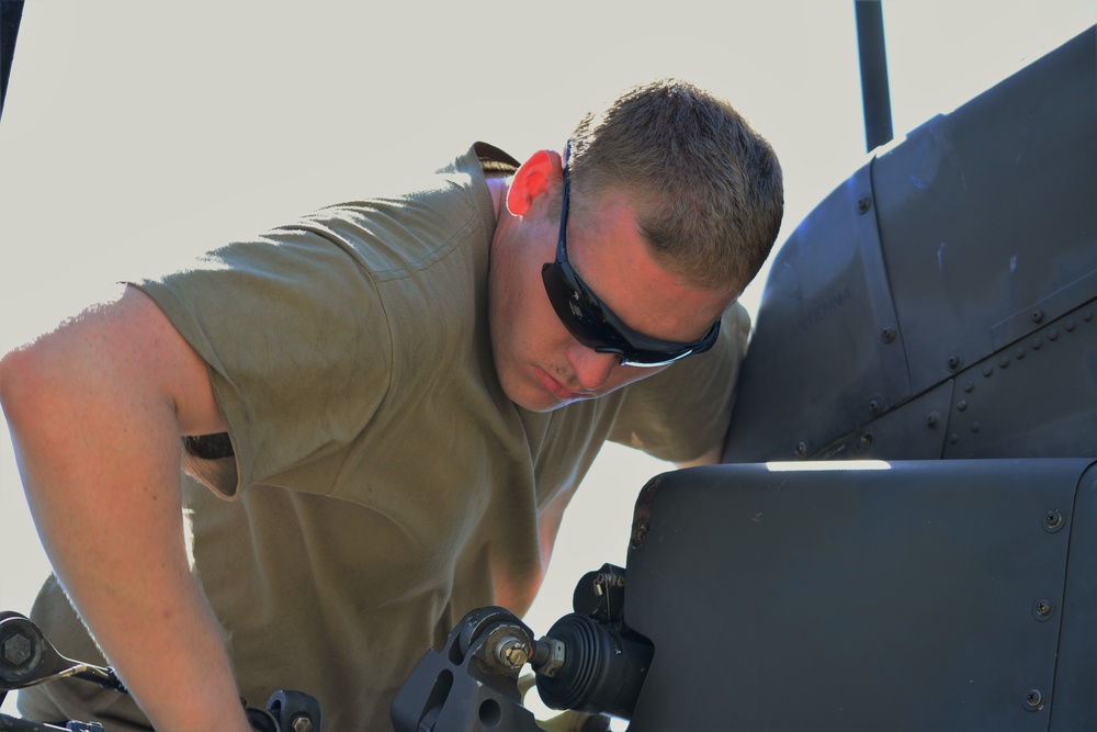 AH-64 Apache helicopter maintenance during Saber Strike 18