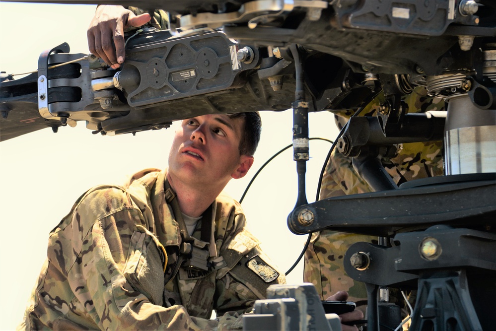 AH-64 Apache helicopter maintenance during Saber Strike 18