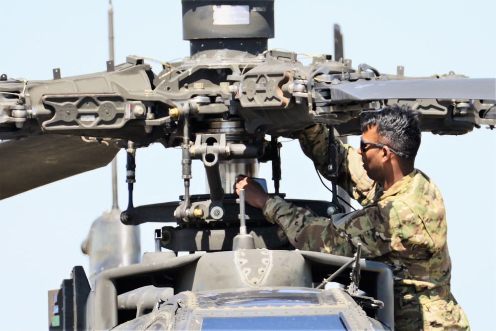 AH-64 Apache helicopter maintenance during Saber Strike 18