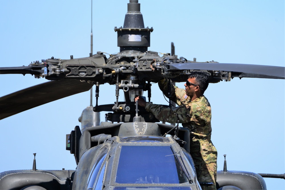 AH-64 Apache helicopter maintenance during Saber Strike 18