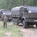 A Polish soldier prepares to escort a convoy during Bull Run 5.5