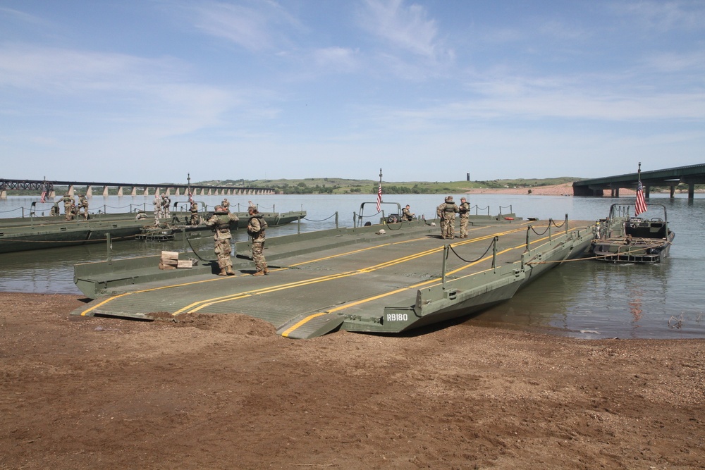 Engineer company crosses the Missouri River