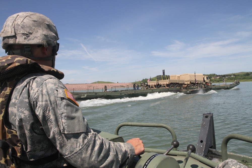 Engineer company crosses the Missouri River