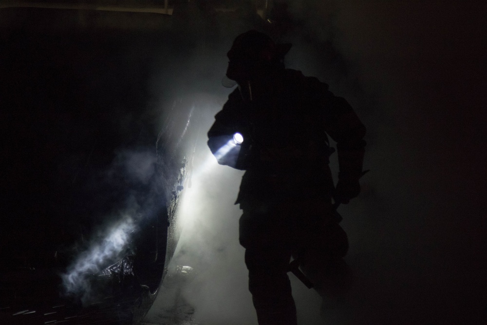 Soldier emerges from smoke during training exercise at Joint Base Cape Cod