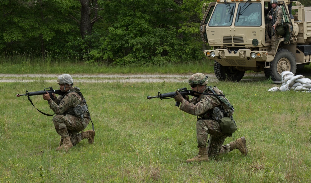 Soldiers aim at potential threat during Combined Arms Exercise