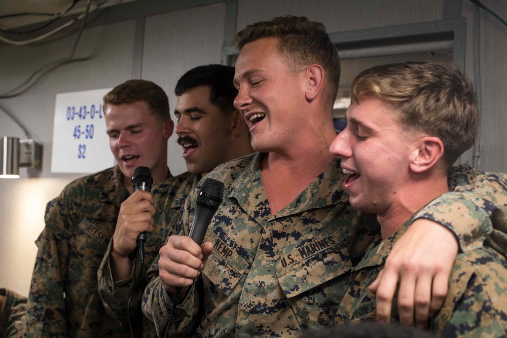 Marines and Sailors participate in karaoke and eat ice cream