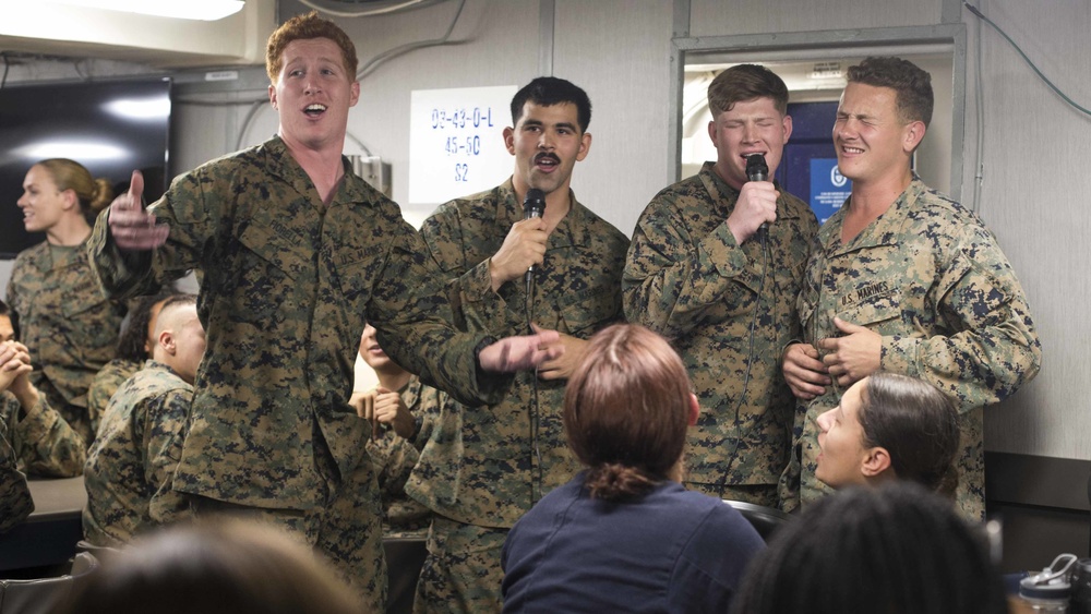 Marines and Sailors participate in karaoke and eat ice cream