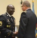 Army Sgt. 1st Class Troy Pringle (left) is congratulated for his retirement by DLA Troop Support Commander Army Brig. Gen. Mark Simerly June 1 in Philadelphia.