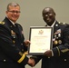 DLA Troop Support Commander Army Brig. Gen. Mark Simerly (left) poses with Army Sgt. 1st Class Troy Pringle after presenting his certificate of retirement June 1 in Philadelphia.