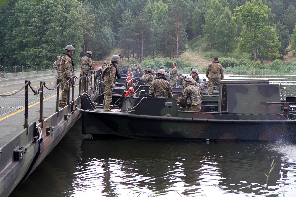 River crossing by U.S. and Polish vehicles