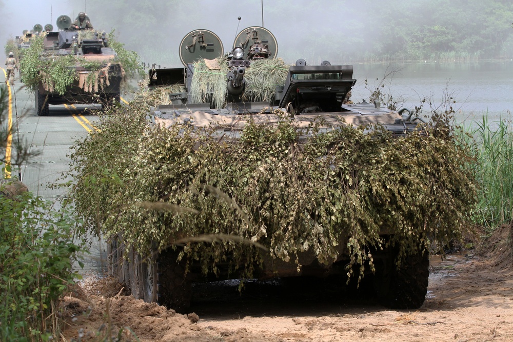 River crossing by U.S. and Polish vehicles