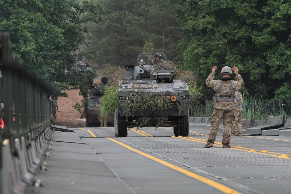 River crossing by U.S. and Polish vehicles