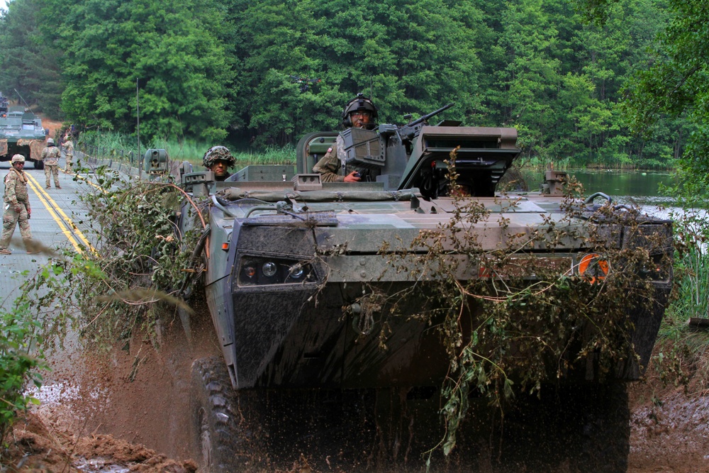 River crossing by U.S. and Polish vehicles