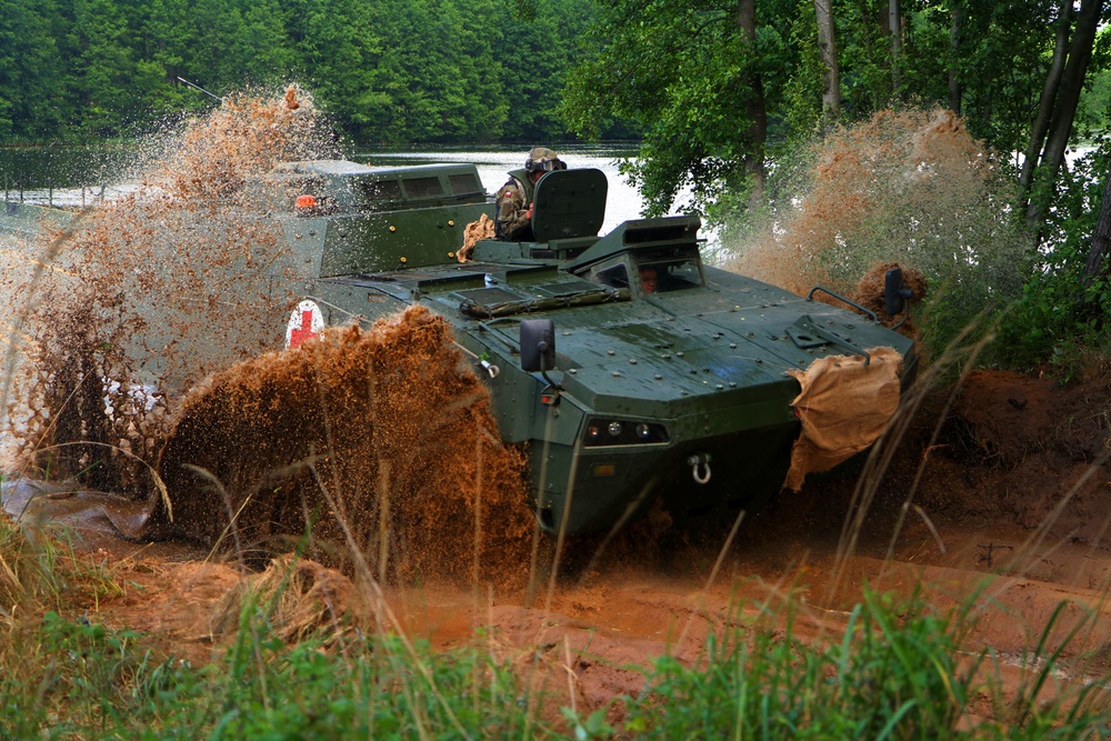 River crossing by U.S. and Polish vehicles