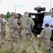 U.K. soldier briefs other soldiers on enemy intel
