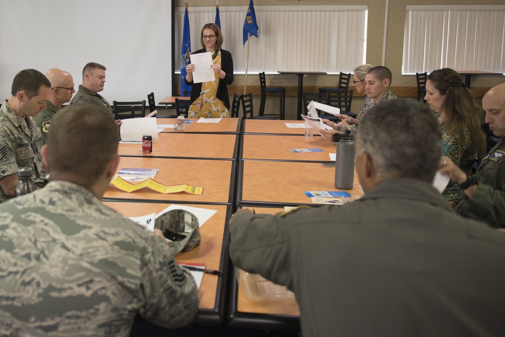 Airman, social worker urges Airmen to volunteer in schools