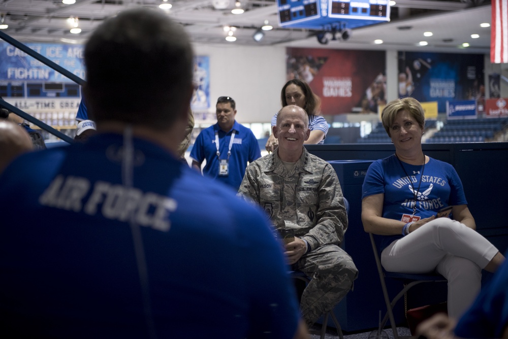 Gen. Stephen W. Wilson speaks with Team Air Force athletes