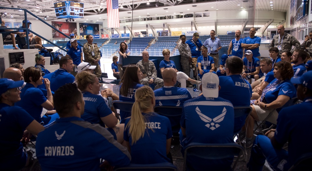 Gen. Stephen W. Wilson speaks with Team Air Force athletes