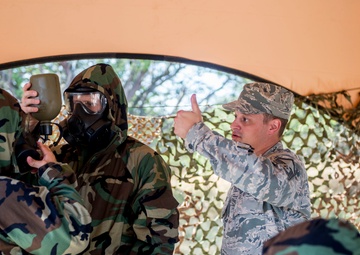 147th emergency management members train active duty counterparts in CBRNE exercises at Hickam AFB