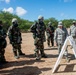 147th emergency management members train active duty counterparts in CBRNE exercises at Hickam AFB