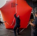 GHWB Sailors Inflate Killer Tomato Target